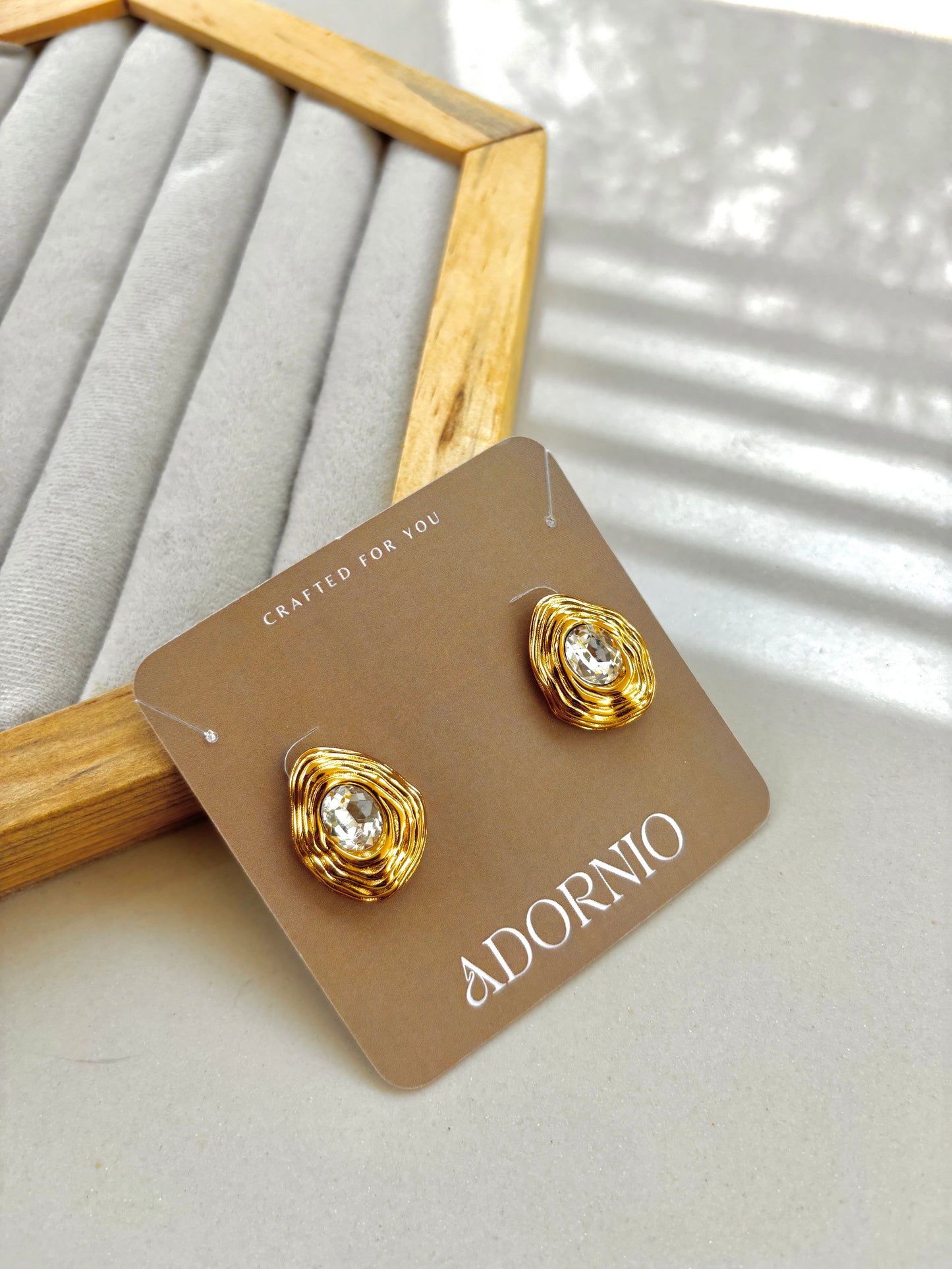 Glimmering Twirl studs